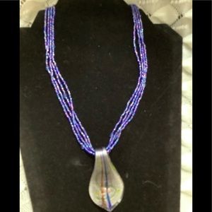 4 Strands of Blue Beads w/ Blown Glass Charm